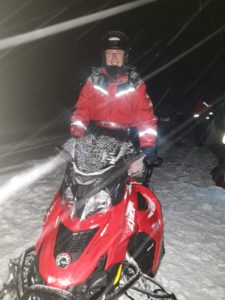 Mike on a snowmobile- Lapland