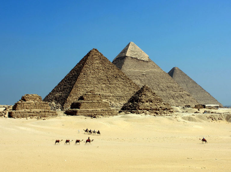 pyramids - blue desert - Egypt - camels